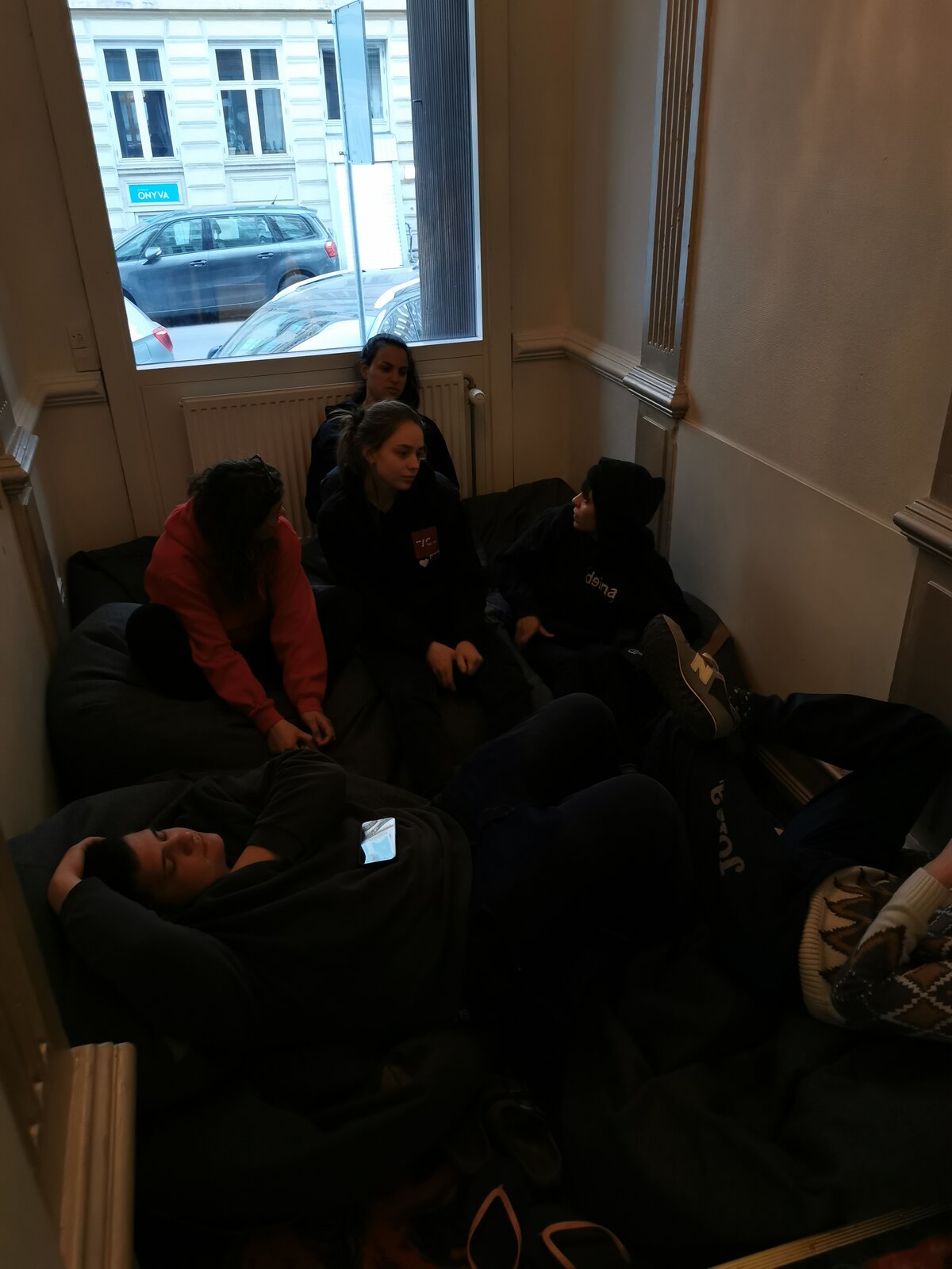 PHOTO OF MATES CHILLING DOWNSTAIRS